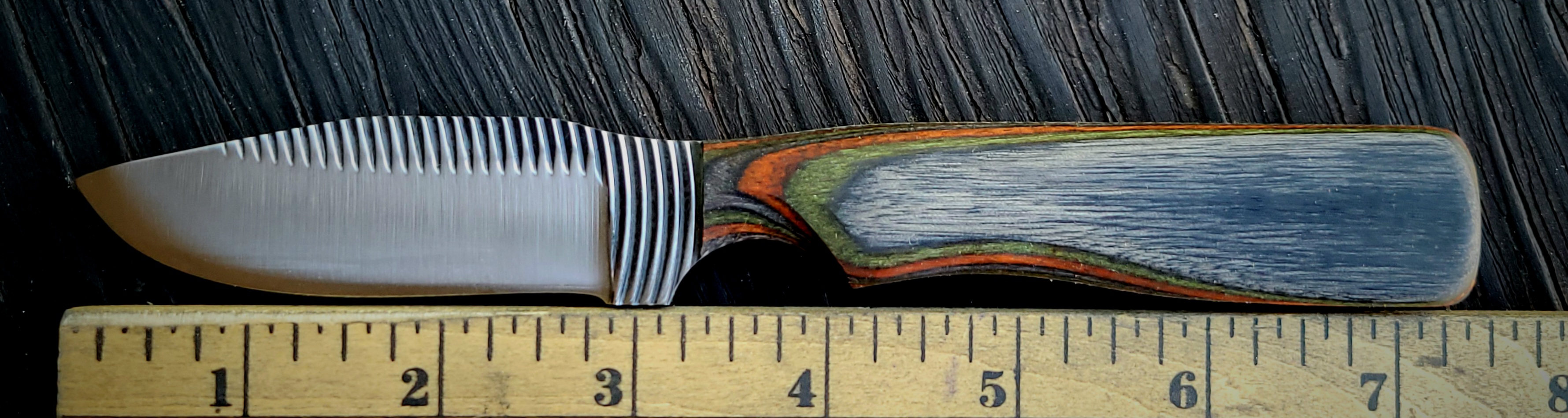 10F BORDER KNIFE-CURVETOOTH-CAMO WOOD